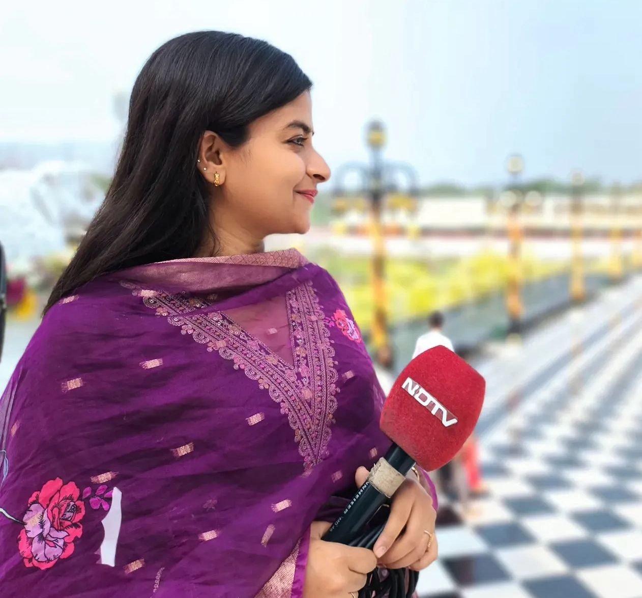 Sujata Dwivedi reporting on location for NDTV