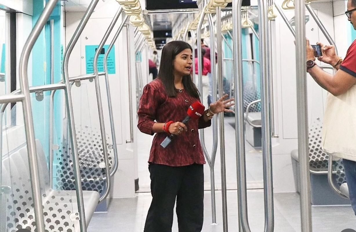 Sujata Dwivedi reporting from inside a metro train